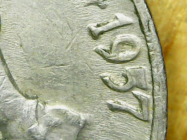 Is-This-A-Die-Chip-On-The-5-Of-This-1957-D-Nickel?
